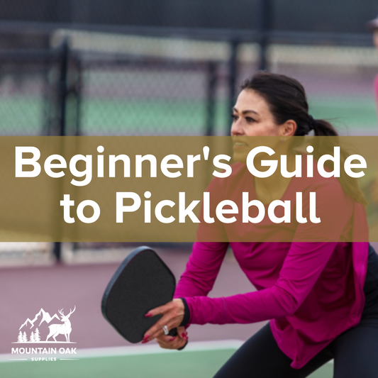 Woman holding a pickleball paddle